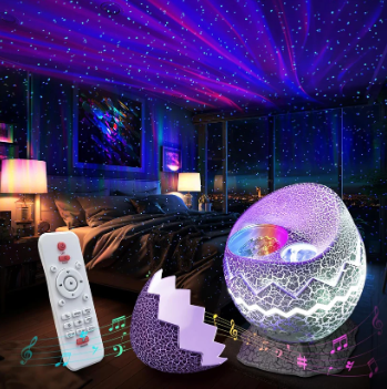 HUEVO DE DINOSAURIO PROYECTOR DE GALAXIAS CON PARLANTE Y BLUETOOTH